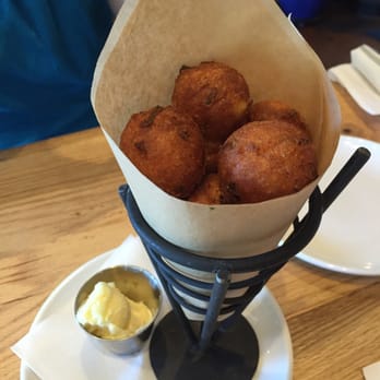 Hook Line & Schooner - Hush puppies with honey butter - American Near Me - Smyrna, Georgia