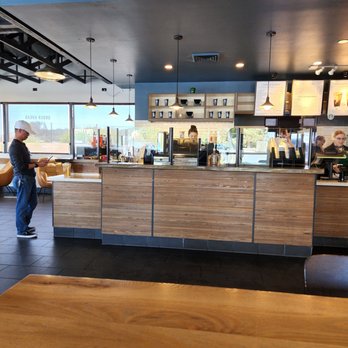 Starbucks - The section where you pick up your order. - Coffee & Tea Near Me - Corona, California Starbucks - The section where you pick up your order. - Coffee & Tea Near Me - Corona, California