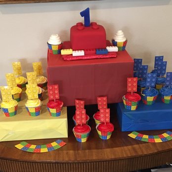 D&D Cake Designs - D&D made the block cake on top and the red velvet cupcakes with white icing.  The cake was a hit and complemented our theme extremely well. - Desserts Near Me - Jacksonville, Florida