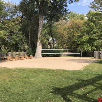 Cuzzy's Brick House - a volleyball court in the backyard - New American Near Me - Chaska, Minnesota
