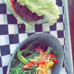 Green style burger and broccoli with peppers and onions