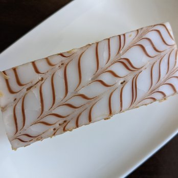 Chez Pierre et Genevieve - A view from the top - the sugar-laden top of the mille feuille. - Bakeries Near Me - Bloomfield Hills, Michigan Chez Pierre et Genevieve - A view from the top - the sugar-laden top of the mille feuille. - Bakeries Near Me - Bloomfield Hills, Michigan