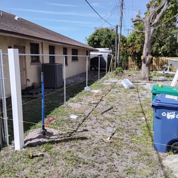 Bruce A1 Fence - Here we are installing polyvinyl fence also chain-link 6 foot next door - Fences & Gates Near Me Bruce A1 Fence - Here we are installing polyvinyl fence also chain-link 6 foot next door - Fences & Gates Near Me
