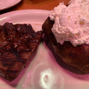 Texas Roadhouse - Well done steak and extra butter on potato. - Steakhouses Near Me - Ashland, Kentucky Texas Roadhouse - Well done steak and extra butter on potato. - Steakhouses Near Me - Ashland, Kentucky