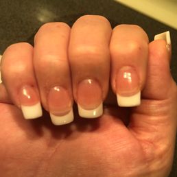 White tips are horrible and uneven. Tip line shouldn't be noticeable. Air pocket under ring finger.