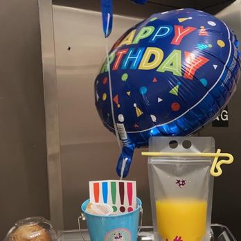 Surprise2go - a tray of food and balloons - Food Delivery Services Near Me