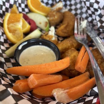 Grand Canyon Brewing + Distillery - Kids chicken tenders and substituted the fries for fruit - Brewpubs Near Me - Flagstaff, Arizona Grand Canyon Brewing + Distillery - Kids chicken tenders and substituted the fries for fruit - Brewpubs Near Me - Flagstaff, Arizona