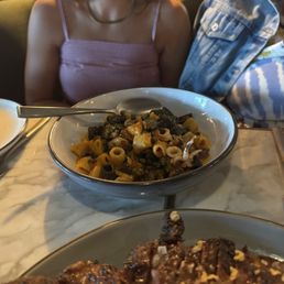 Mezzi rigatoni, small portion but delicious with its pepperoni and calamari ragu. Mezzi rigatoni, small portion but delicious with its pepperoni and calamari ragu.