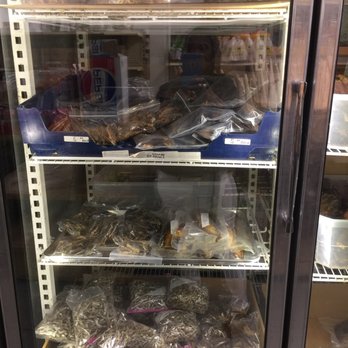 Makola African Market - a display case filled with food - International Grocery Near Me - Aurora, Colorado