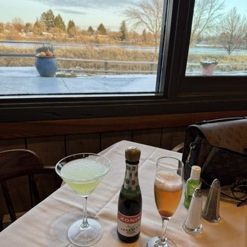 Sandpiper Restaurant - On the left apple martini, aka Lemon drop totally sour., on the right a champagne cocktail in the correct glass, - Seafood Near Me - Idaho Falls, Idaho Sandpiper Restaurant - On the left apple martini, aka Lemon drop totally sour., on the right a champagne cocktail in the correct glass, - Seafood Near Me - Idaho Falls, Idaho