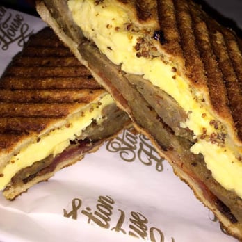 Station House - "The Morning After" Panini which consists of Scrambled Eggs, Thick-Cut Applewood Bacon, Sage Sausage, Whole Grain Mustard, Beer Braised Onio - Shared Office Spaces Near Me - St Petersburg, Florida Station House - "The Morning After" Panini which consists of Scrambled Eggs, Thick-Cut Applewood Bacon, Sage Sausage, Whole Grain Mustard, Beer Braised Onio - Shared Office Spaces Near Me - St Petersburg, Florida