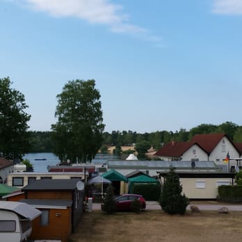 Seeterrasse - Blick auf den Kahler See mit dem DRK-Haus (Deutsches Rotes Kreuz) - Italian Near Me - Kahl am Main, BY Seeterrasse - Blick auf den Kahler See mit dem DRK-Haus (Deutsches Rotes Kreuz) - Italian Near Me - Kahl am Main, BY