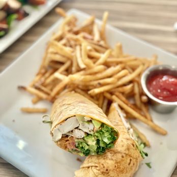 Ember & Greens - E&G Wrap ($13) - chicken, avocado, romaine, carrots cucumber, tomato with truffle fries. Loved how truffle-y the fries were! - New American Near Me - Houston, Texas Ember & Greens - E&G Wrap ($13) - chicken, avocado, romaine, carrots cucumber, tomato with truffle fries. Loved how truffle-y the fries were! - New American Near Me - Houston, Texas