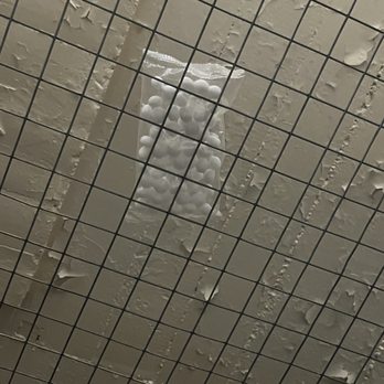 Extra Space Storage - moth ball bag thrown above unit with permeating gas smells - Self Storage Near Me - Chicago, Illinois