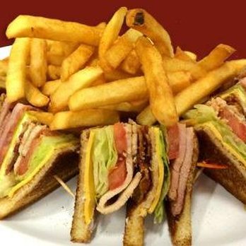 Ron's Lumberjack Cafe - Club Sandwich with French Fries - Breakfast & Brunch Near Me - Howe, Oklahoma Ron's Lumberjack Cafe - Club Sandwich with French Fries - Breakfast & Brunch Near Me - Howe, Oklahoma