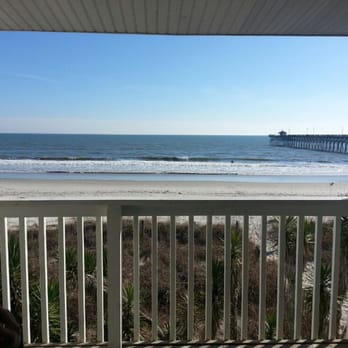 Ocean Crest Motel - View from oceanfront room. - Hotels Near Me - Oak Island, North Carolina Ocean Crest Motel - View from oceanfront room. - Hotels Near Me - Oak Island, North Carolina