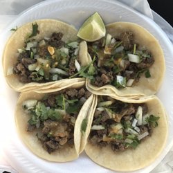Taqueria El Corral - 4 asada tacos for $6.28 after tax. Delicious!