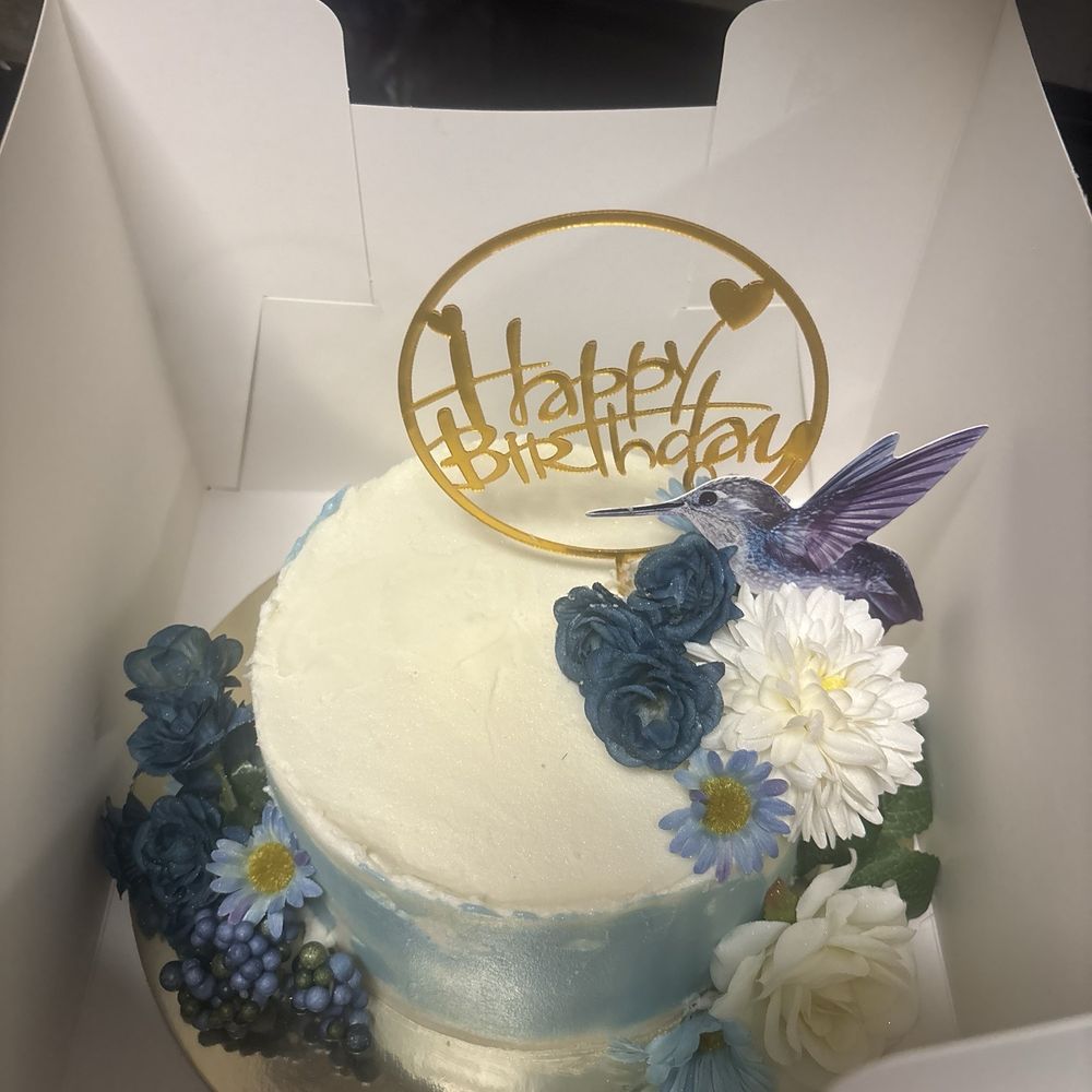 Unsugared Bakery - Lemon cake with cream cheese frosting. I didn't ask for decoration but she put this together when I told her nana's favorite color was blue - Desserts Near Me Unsugared Bakery - Lemon cake with cream cheese frosting. I didn't ask for decoration but she put this together when I told her nana's favorite color was blue - Desserts Near Me