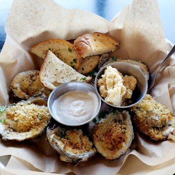 Donovan's Meatery - Chargrilled Oysters with seasoned sourdough bread and horse radish sauce - Steakhouses Near Me - Riverview, Florida Donovan's Meatery - Chargrilled Oysters with seasoned sourdough bread and horse radish sauce - Steakhouses Near Me - Riverview, Florida