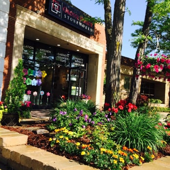 Grosse Pointe Stone Works - a flower bed in front of a store - Interior Design Near Me - Grosse Pointe, Michigan Grosse Pointe Stone Works - a flower bed in front of a store - Interior Design Near Me - Grosse Pointe, Michigan