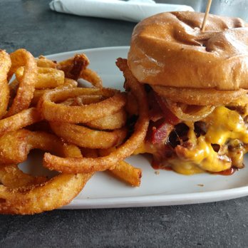 PopStroke - Smokehouse Burger w/ Onion Rings - Mini Golf Near Me - Fort Myers, Florida PopStroke - Smokehouse Burger w/ Onion Rings - Mini Golf Near Me - Fort Myers, Florida