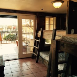Guadalupe River Lodge Vacation Rental - Best In Texas - Bunk Room patio updated with privacy panels