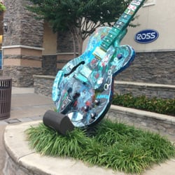 Tunes (country) play on the exterior of all the shops.