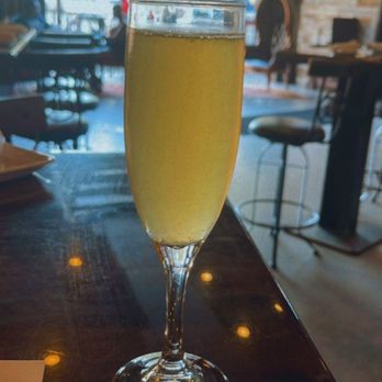 Bosscat Kitchen & Libations - Pineapple mimosa - New American Near Me - Houston, Texas Bosscat Kitchen & Libations - Pineapple mimosa - New American Near Me - Houston, Texas