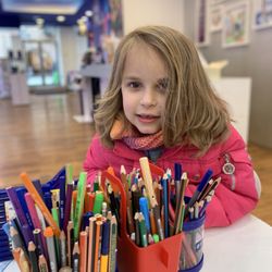 Staedtler Welt - My wife is looking over the awesome drawing tools and they have a great kids station set up for the kids.