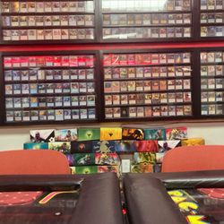 Polyhedron Gamestore Manchester - Super cool wall of MTG singles.