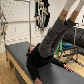 Serenity Pilates - Claire with a hip replacement doing the parrot. - Pilates Near Me - Green Valley, Arizona