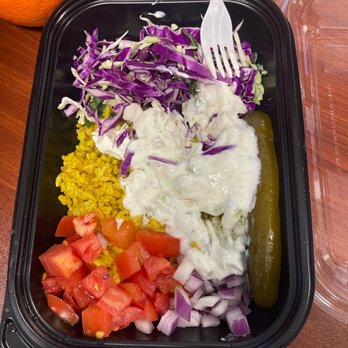 Pita Jungle - a salad in a plastic container with a fork - Mediterranean Near Me - Phoenix, Arizona Pita Jungle - a salad in a plastic container with a fork - Mediterranean Near Me - Phoenix, Arizona