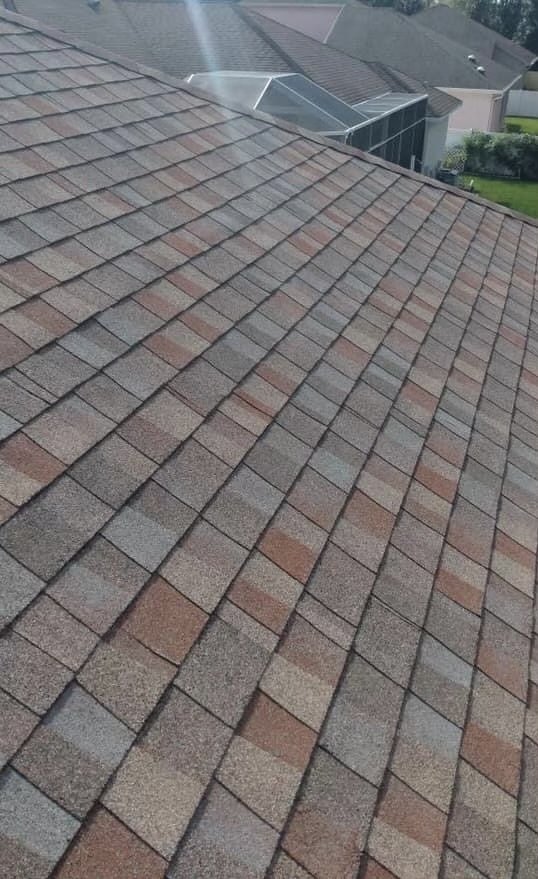 Slide of Her Construction Roofing Specialists 