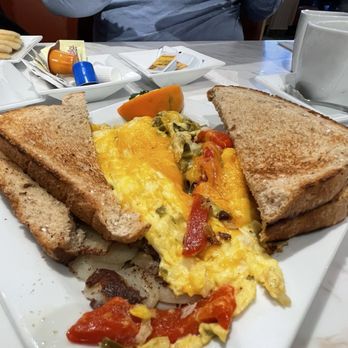 Keke's Breakfast Cafe - Scrambler Bowl w/ onion, red peppers and jalapeños - Breakfast & Brunch Near Me - Orlando, Florida Keke's Breakfast Cafe - Scrambler Bowl w/ onion, red peppers and jalapeños - Breakfast & Brunch Near Me - Orlando, Florida