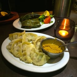 Zinger Taj Indian Cuisine - Nepalese Chicken Momo Typical Nepalese style steamed chicken mince dumplings. Served with home made tomato chutney $10.90
