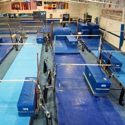 International Gymnastics Camp - Designed for gymnasts to excel on bars, IGC has eight full sets of uneven bars, high and low strap bars, single rails, and drill stations.