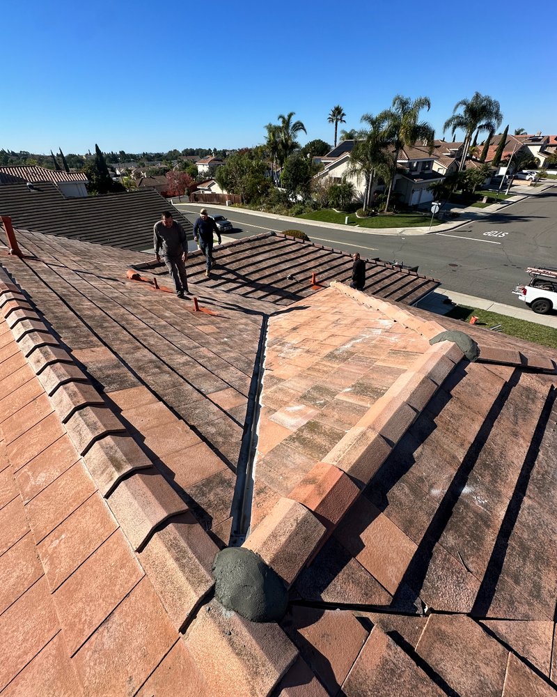 Slide of Leyva's Roofing & Services