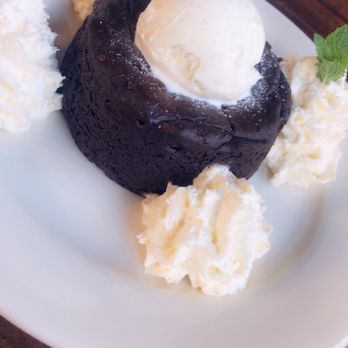 Zaytoon - Flourless chocolate cake with vanilla ice cream - Lebanese Near Me - Santa Barbara, California Zaytoon - Flourless chocolate cake with vanilla ice cream - Lebanese Near Me - Santa Barbara, California