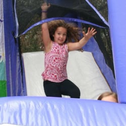 Bounce Party Rentals - Palm Coast - Going down the slide on one of our bounce house combos