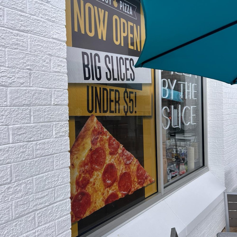 Wiseguy Pizza - a slice of pizza in the window - Pizza Near Me - Herndon, Virginia Wiseguy Pizza - a slice of pizza in the window - Pizza Near Me - Herndon, Virginia