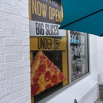 Wiseguy Pizza - a slice of pizza in the window - Pizza Near Me - Herndon, Virginia
