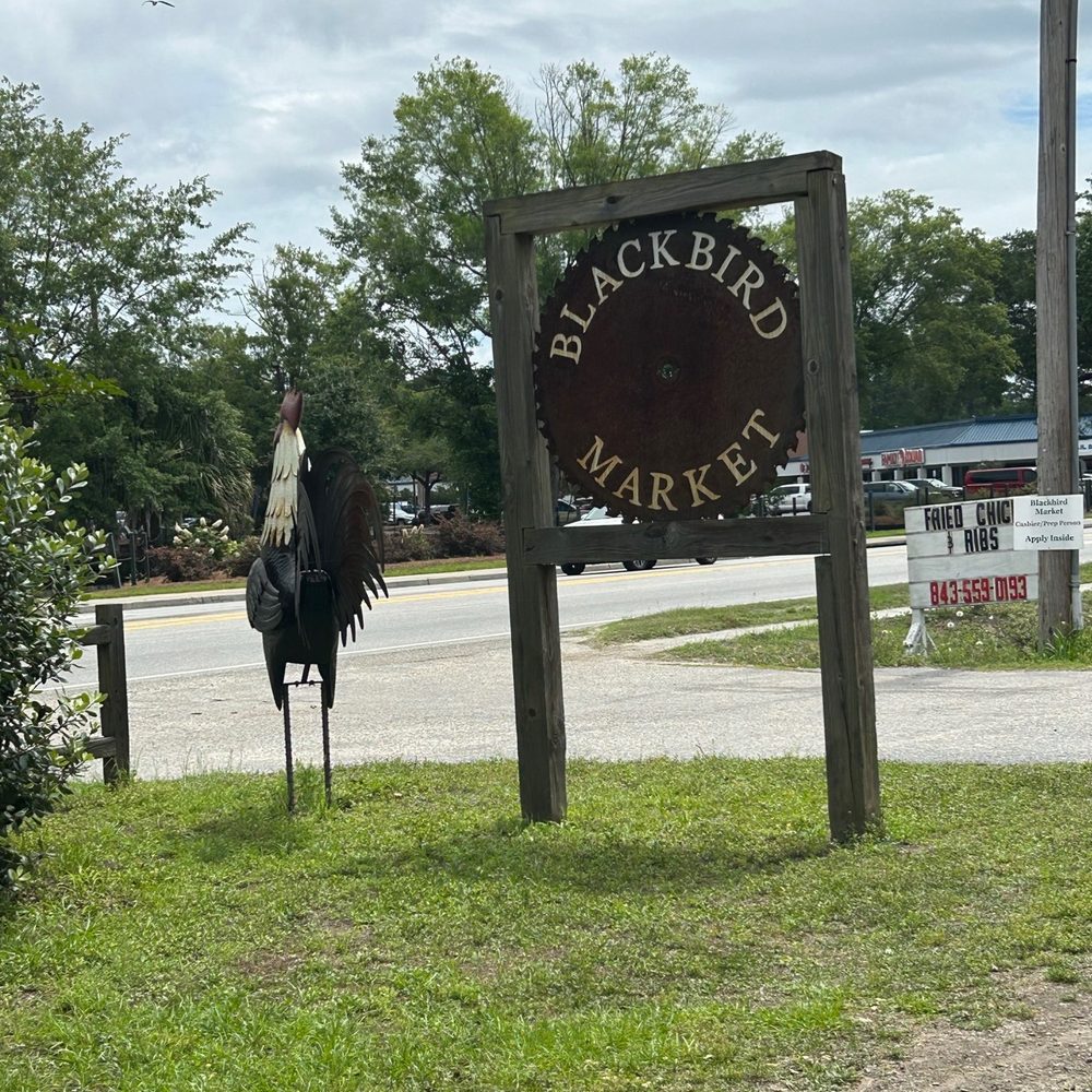 Sign from picnic benches outside