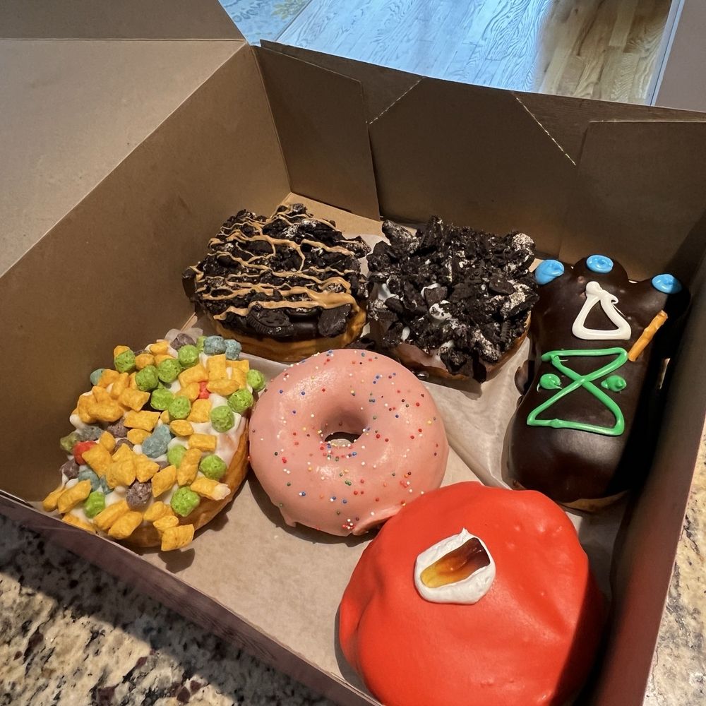 Voodoo Doughnut - Voodoo, cherry cola, odb, captain crunch, homer, and Oreo - Donuts Near Me - Chicago, Illinois