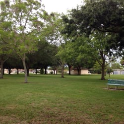 Some shady grassy areas. Next to a busy street so not very serene.