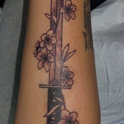 Karmic Tattoo - Arm tattoo