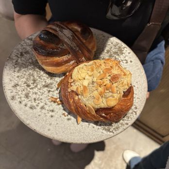 La Cabra - cardamom bun and almond croissant - Coffee & Tea Near Me - New York, New York La Cabra - cardamom bun and almond croissant - Coffee & Tea Near Me - New York, New York