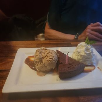 Tavern West - Flourless chocolate cake + coffee ice cream - New American Near Me - Frisco, Colorado Tavern West - Flourless chocolate cake + coffee ice cream - New American Near Me - Frisco, Colorado