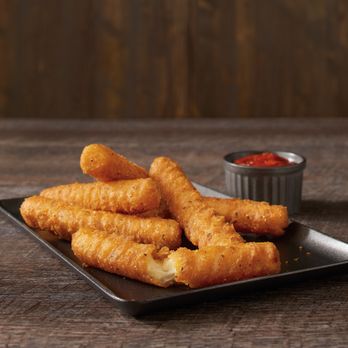 Rally's - Our Famous Fry seasoning on crispy, cheesy mozzarella sticks - Burgers Near Me - Bloomington, Indiana Rally's - Our Famous Fry seasoning on crispy, cheesy mozzarella sticks - Burgers Near Me - Bloomington, Indiana