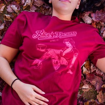 Rice and Beans - a woman laying on leaves - Food Trucks Near Me Rice and Beans - a woman laying on leaves - Food Trucks Near Me