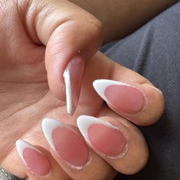Full set acrylic beyond messy did not clean up the cuticles did not trim nails, nail polish is bubbly and spotty Full set acrylic beyond messy did not clean up the cuticles did not trim nails, nail polish is bubbly and spotty